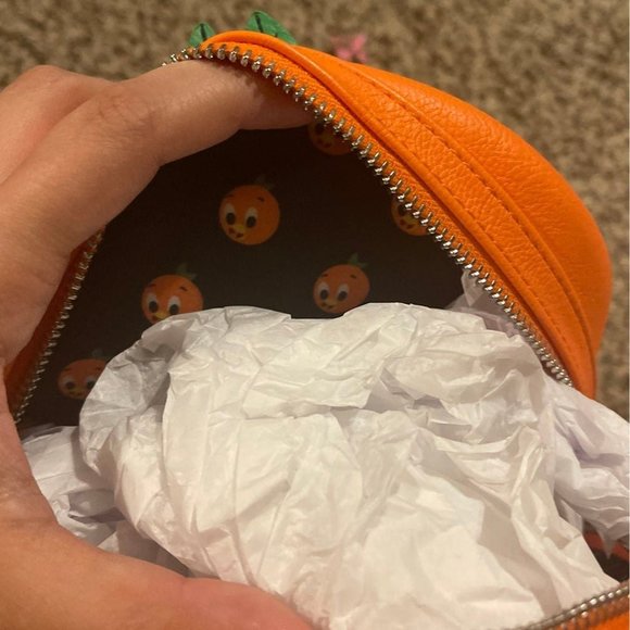 Loungefly orange bird backpack
